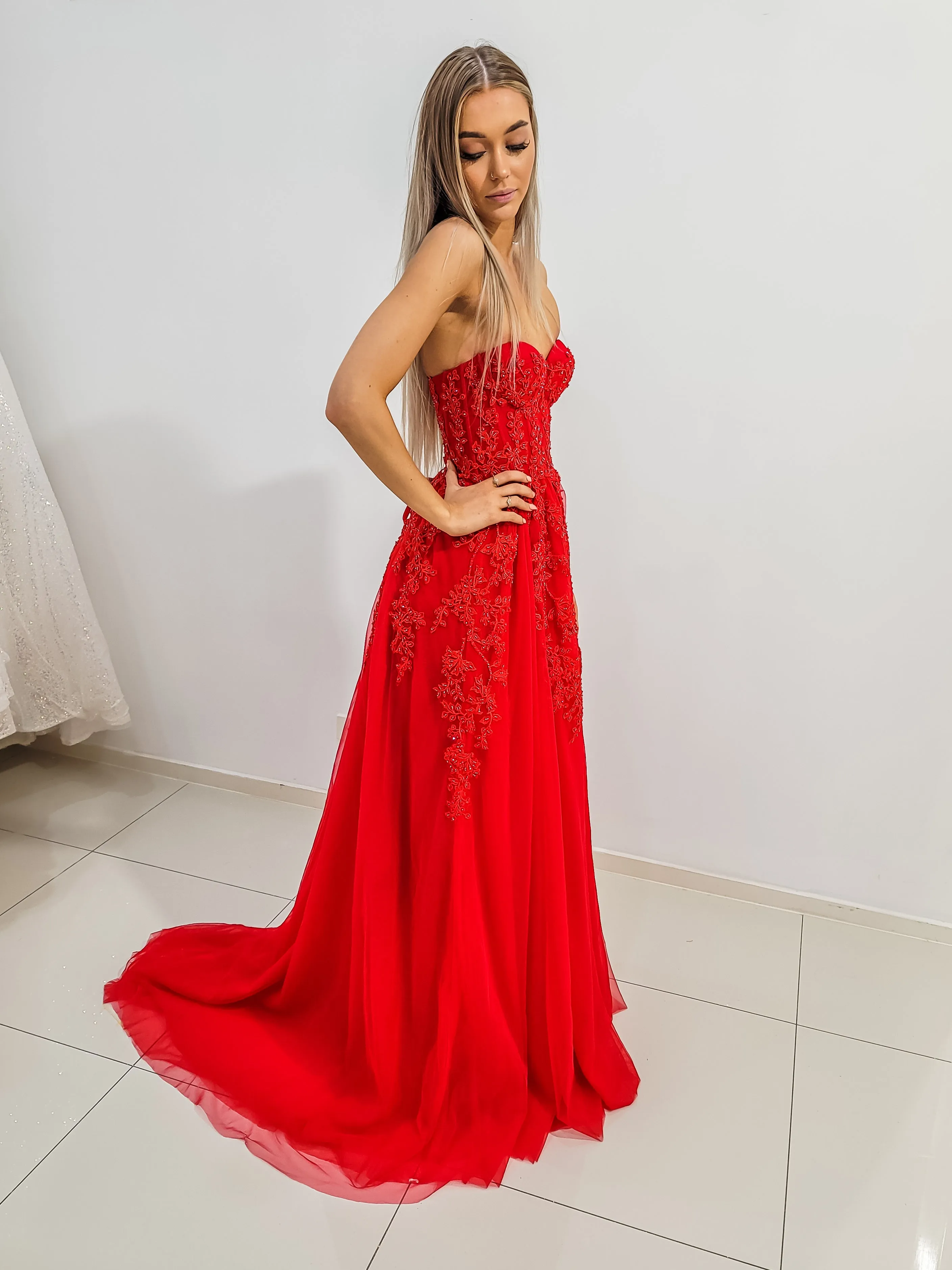 Red bustier top tulle dress with slit