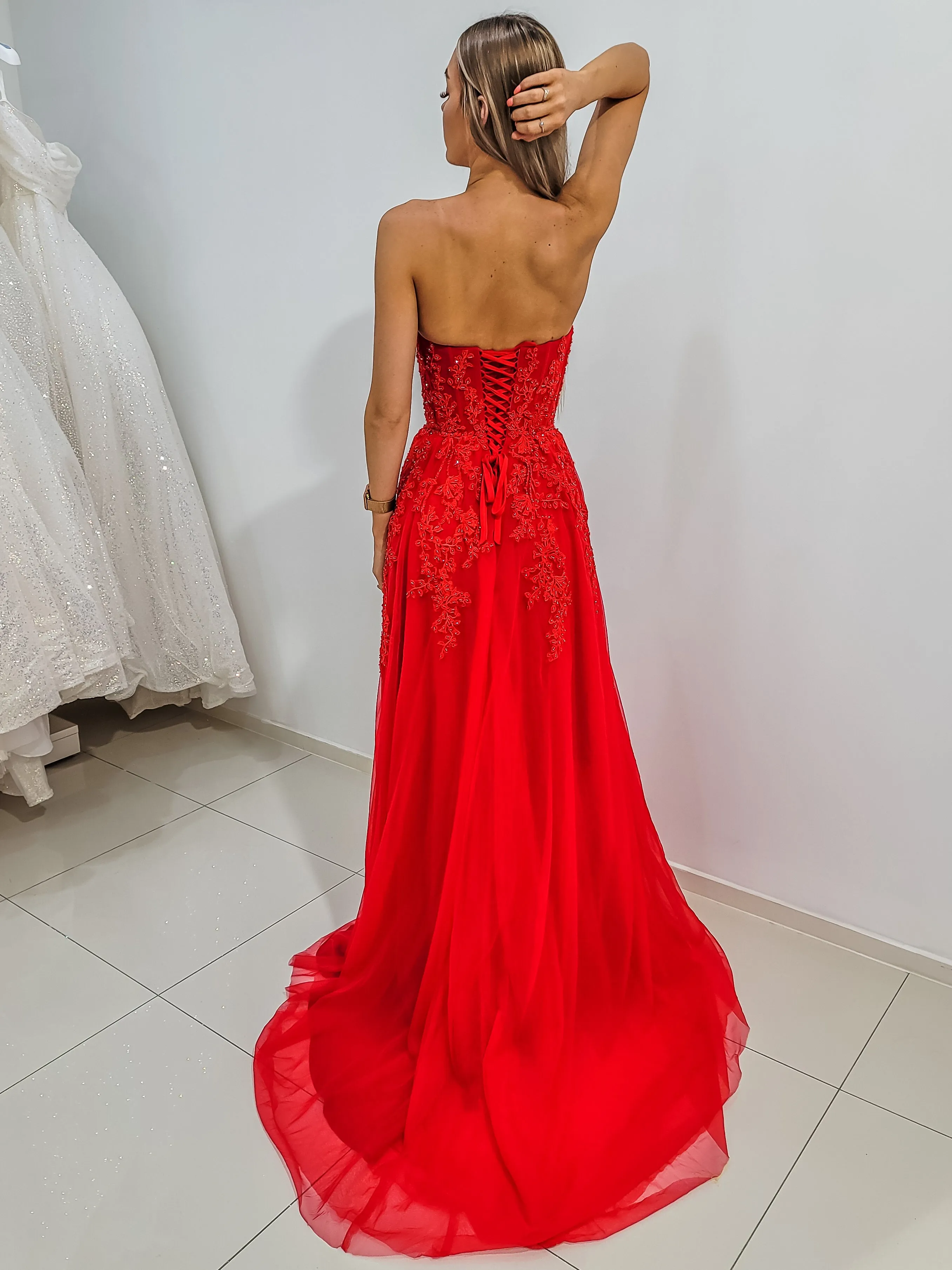 Red bustier top tulle dress with slit